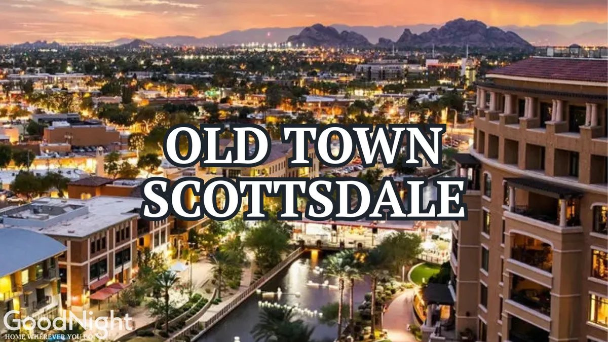 A vibrant street scene featuring the iconic Old Town Scottsdale signage, a scenic waterway, and surrounding buildings bustling with activity. The image captures people walking along the water, dining at outdoor cafes, and shopping in local boutiques, evoking the lively, walkable atmosphere of the neighborhood.
